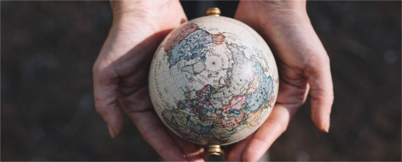 Globe map in hands